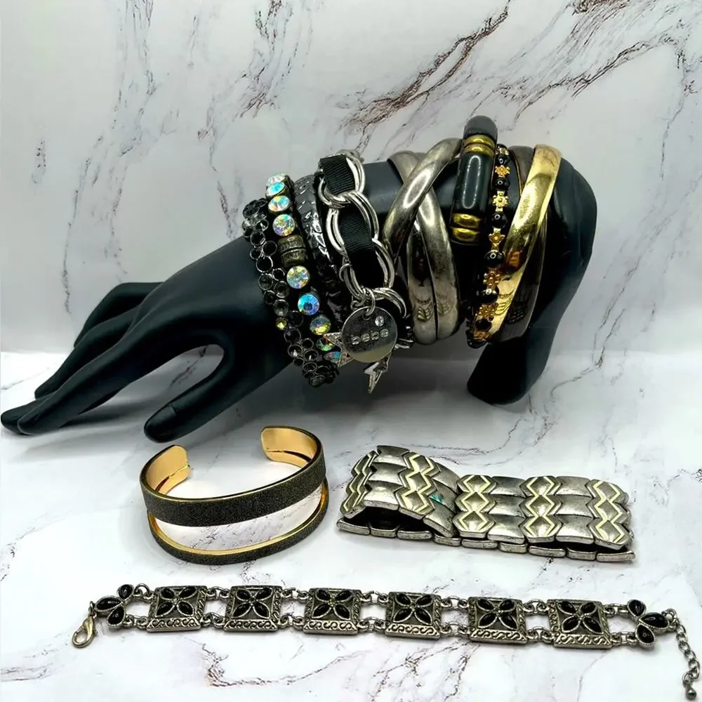 Set of 10 silver and gold tone black bracelets